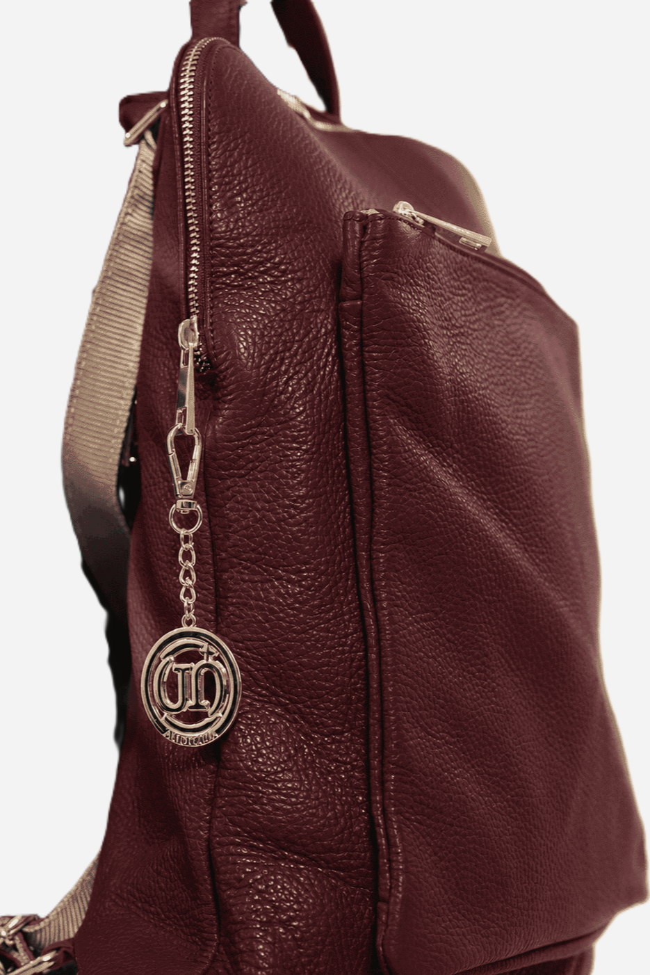 Cristina women's backpack in genuine wine-colored leather with zip pockets